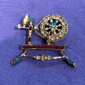 CORO SPINNING WHEEL PIN.